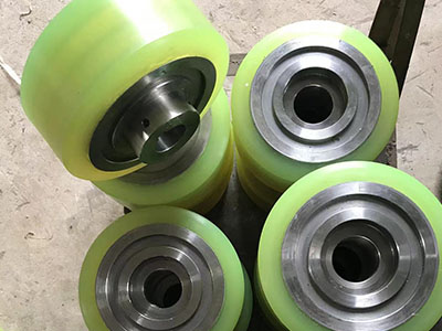 PU friction drive wheels in automobile production lines